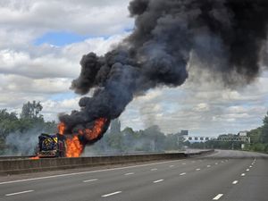 Supporting image for story: Huge plumes of black smoke seen billowing over M6 near Stafford due to lorry fire as drivers warned of delays