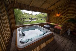 You can even enjoy watching the tigers from a hot tub. Photo: West Midland Safari Park