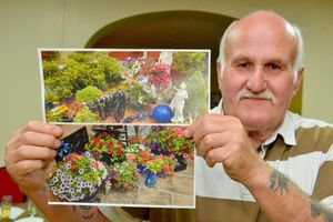 Tim Hayward showing off his garden which won Best Water Garden