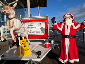 A Santa member of the small team praised by Rotary president.