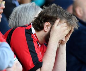 Dejected Walsall fans in the Vale defeat
