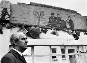 These distinctive murals painted by Sergeant Lew Sahilka
of the American 8th Army Air Force during the Second World War were about to disappear in February as am bungalow used by US forces was set to be demolished.
The bungalow formed part of the US base at Yarnfield, which was by the 1970s being used by the Post Office as a training centre. Pictured in front of the murals was Bill Wellings of the training school.
