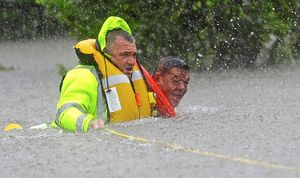 Wilford Martinez is rescued from his car in floodwaters 
