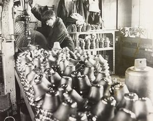 Edwin Preston, bell-makers, Jenner Street, Wolverhampton, June 1970: 'A mountain of hand bells ready for drilling by 16-year-old Malcolm Shaw of Bilston.'