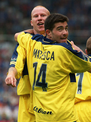'That's my boy!'...Enzo Maresca hugs goalscorer Lee Hughes after the equaliser against Blues at St Andrews.