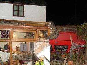 Supporting image for story: Shock as car hits house