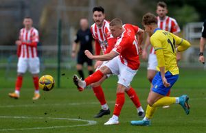 Stoubridge's Darryl Knights and Soliull Moors man Harry Boyes
