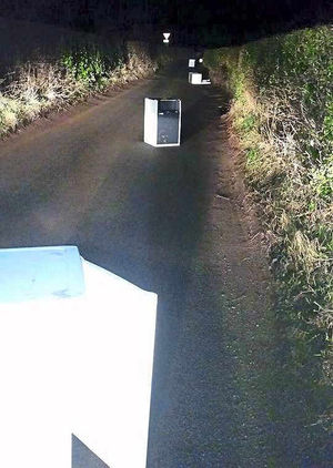 Obstacle course . . . the road near Newport, littered with illegally dumped fridges