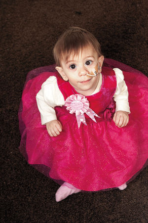 Olivia Austin pictured on first birthday at home in Shrewsbury