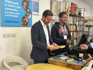 Alex Ballinger MP for Halesowen getting amerced in volunteering