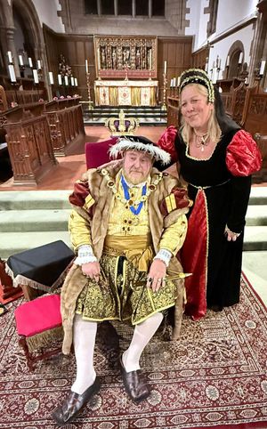 Henry VIII with Lions President Debra Coburn as Anne Boleyn