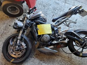 Ruth's damaged motorbike after accident.