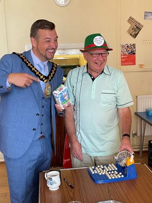The Mayor has a go at bingo calling on one of his visits
