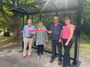 From left: Ian Cruise-Taylor (clerk at The Gorge Parish Council), Councillor Caroline Bagnall (Mayor of Broseley), Alan Taylor (chairman of The Gorge Parish Council) and Jenna Munday (clerk at Broseley Town Council) open the new bus shelter in Calcut