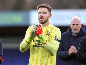 Rangers goalkeeper Jack Butland acknowledges the fans