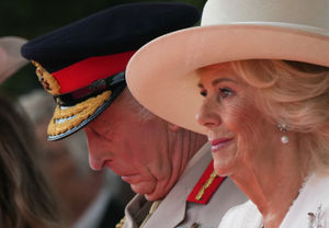 King Charles III and Queen Camilla react as they attend the national Service of Remembrance, hosted by the Royal British Legion in partnership with the Government, to mark the 80th Anniversary of VJ Day at the National Memorial Arboretum in Alrewas, Staffordshire. Picture date: Friday August 15, 2025. PA Photo. Photo credit should read: Christopher Furlong/PA Wire 
