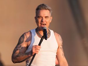 Supporting image for story: Robbie Williams entertains BST crowd with special guest Danny Dyer