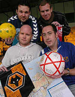 Four Shropshire football fanatics have lived their dream by touring all 92 league football grounds and the new Wembley Stadium to raise thousands of pounds for charity.