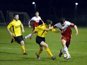 Ellesmere's Matty Ryan and Wem's Adam Jones.
Elesmere in yellow
