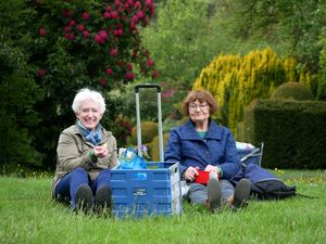 Two ladies enjoying a picnic at the plant fair