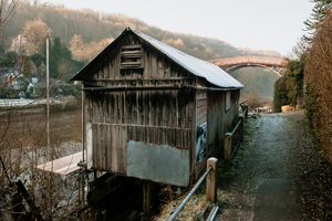 The Coracle Shed with the Iron Bridge in the background