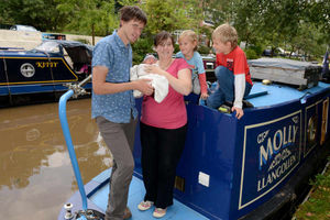 Baby Cerys with parents Kailey and Josuha and brothers Henry, 4, and Aiden, 8