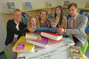 Poppyfield Primary Academy in Hednesford came third in our Cash for Schools competition. Pictured: headteacher Becky Scordis with pupils and sponsors.