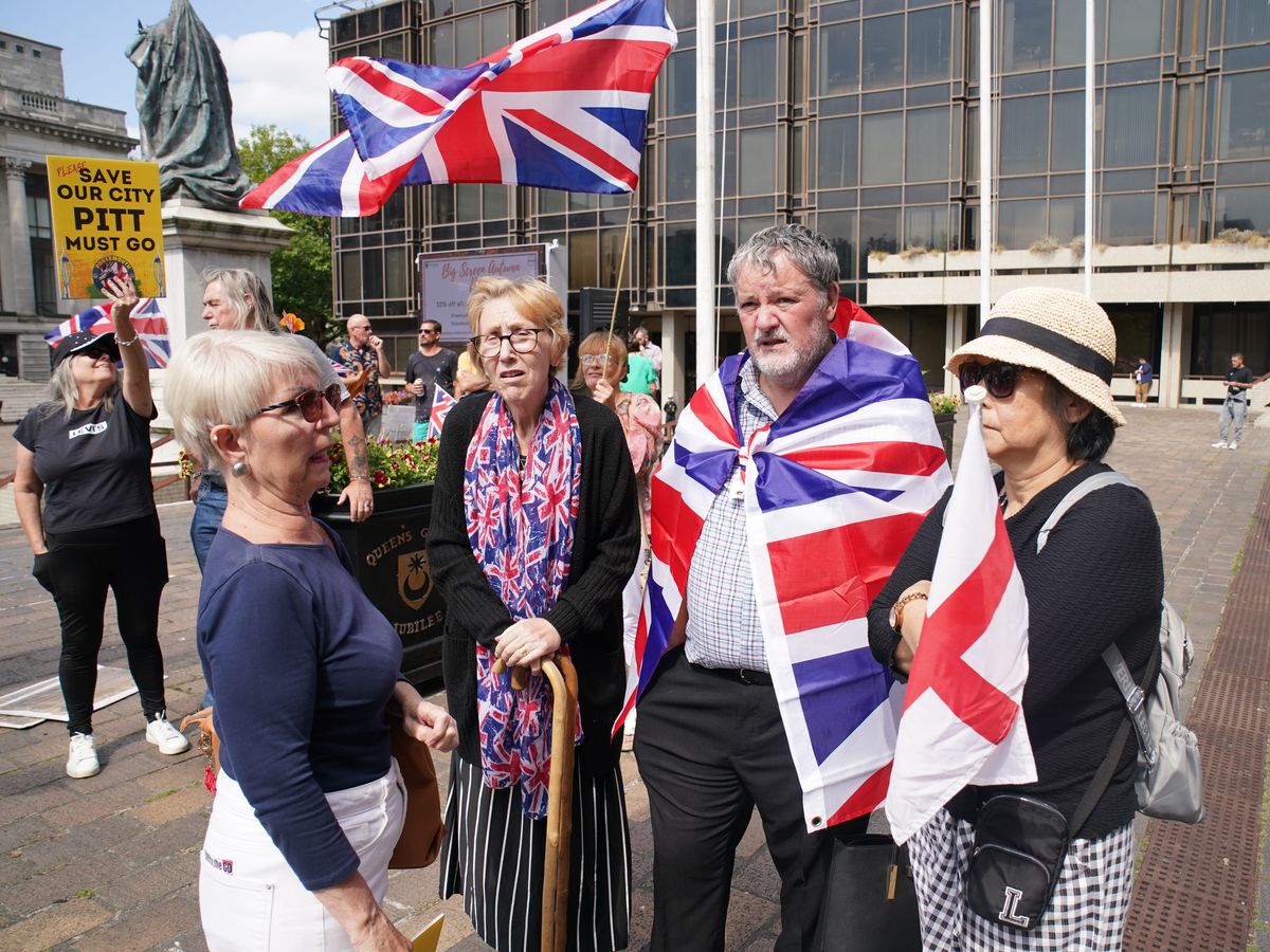 Anti-immigrant protesters face off with counter-demonstrators in Portsmouth