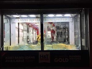 Smashed glass after the raid