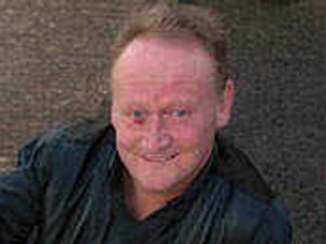 Supporting image for story: David's humorous odes to home town