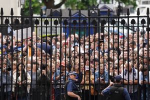 Crowds gathered outside the gates of Downing Street as Boris Johnson made his announcement