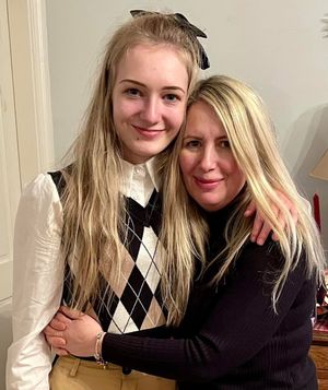 Lily-May Vaughan getting a hug from mum Leanne