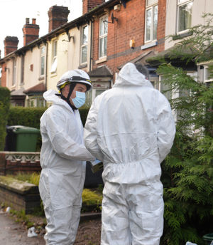 Forensic officers were at the scene to examine the house 