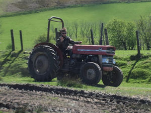 Ben Weaver on his tractor coming down off Beacon Hill
