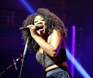 Beverley Knight performing on stage at Birmingham's Symphony Hall