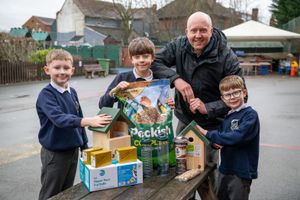 Carl Badger, Deputy Head, with the pupils at Old Hill Primary School following the donation