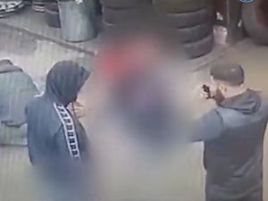 A still of the pair from the CCTV released by police 