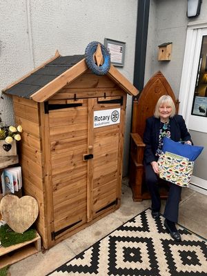 Soroptimist Pat Stanley with one of the Reading Pillows 