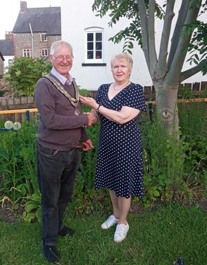 Knighton Mayor Councillor Tom Taylor was congratulated by out-going Mayor Councillor Chris Branford