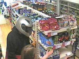 Supporting image for story: Thief in motorbike helmet robbed Halesowen store and brandished gun