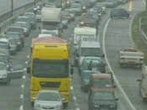 Supporting image for story: Drivers in 12-hour flood jams