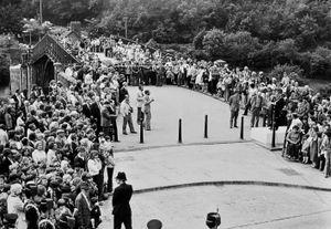 Crowds on the world famous Iron Bridge on Monday, July 2, 1979, at the start of bicentenary celebrations for the bridge, which was celebrating its 200th birthday. Hector Munro, a Parliamentary Environment secretary responsible for historic monuments, cut a ribbon to start a procession of steam and horse drawn vehicles. The dignitaries are on/by the platform on the right. Thousands crammed the streets to watch a procession and parade through the town.