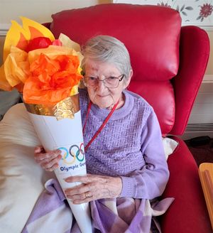 Resident Margaret Allen with the residents' Olympic torch