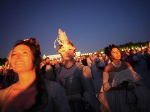 Supporting image for story: In Pictures: Revellers in baroque costumes dance until dawn at masked ball