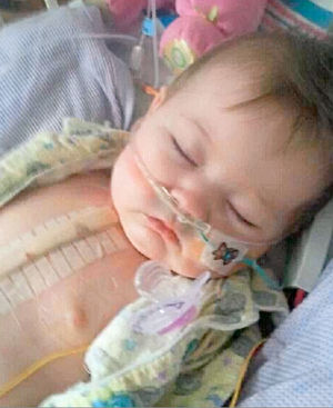 The fighter had her first operation when she was six months old