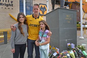 Peter, Dilara and Sara Coles were some of the first supporters to arrive at Molineux this morning.