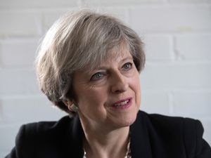 Supporting image for story: Theresa May calls for more action by tech giants over online extremism 