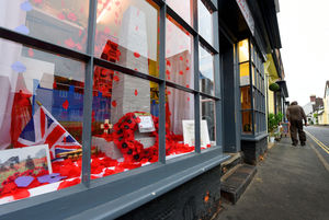 The window of Catherine's Bakery in Much Wenlock. The town displayed poppies for Remembrance Day. The window of Catherine's Bakery.