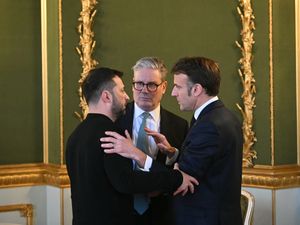 (l to r) Volodymyr Zelensky, Sir Keir Starmer and Emmanuel Macron talk during the defence summit