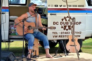 Tom Dibb performing at the Water's Edge Festival.